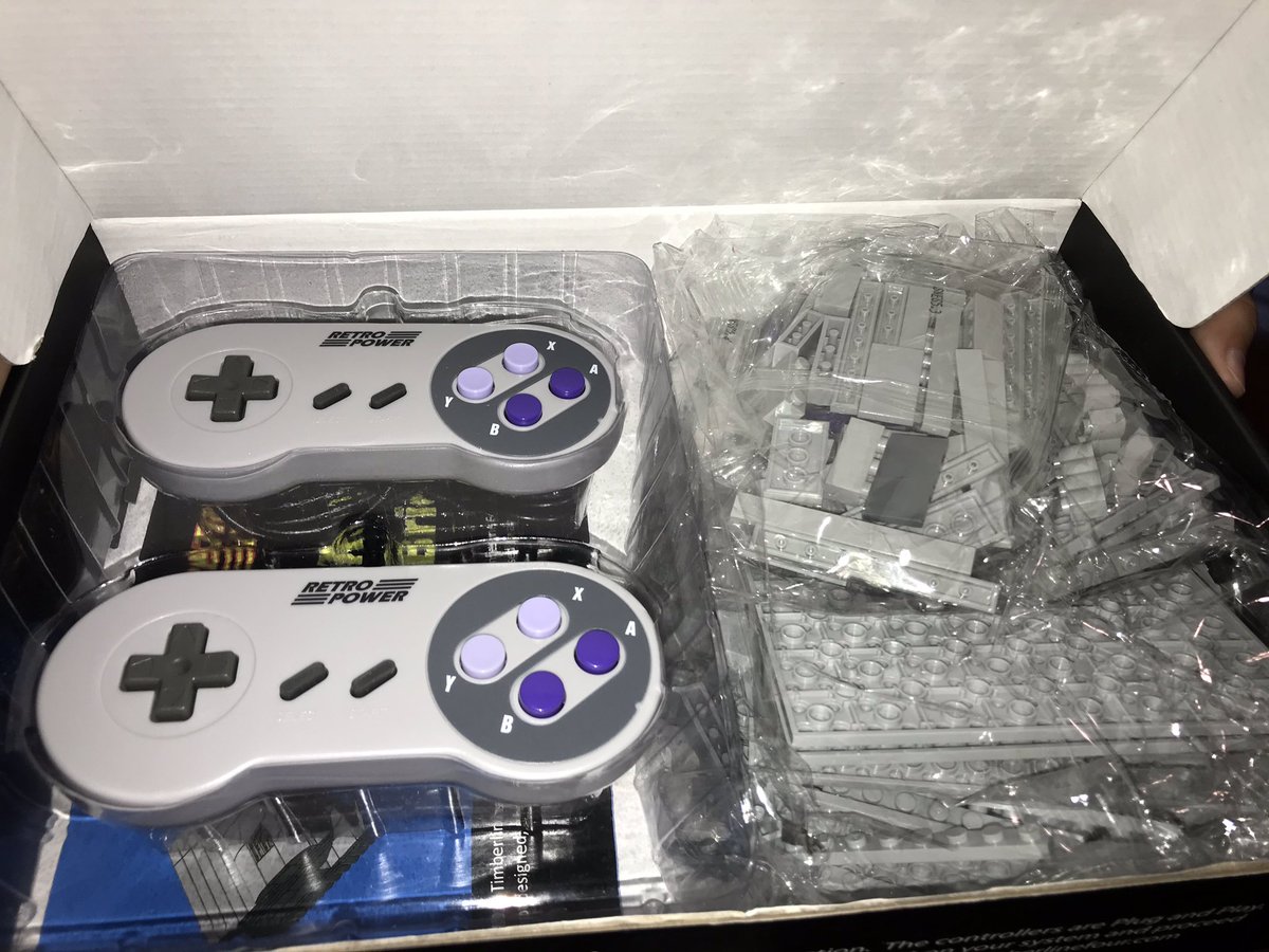 retrogameboyz's tweet photo. Today for #NintendoTuesday I’m sharing a thoughtful gift from the family. No socks or tie thank goodness. This is a lego-like case for your #RaspberryPi complete with USB controllers. Boy and I are starting to build it for my Arcade cab. Other designs available too https://t.co/ZgCrZy3MdJ