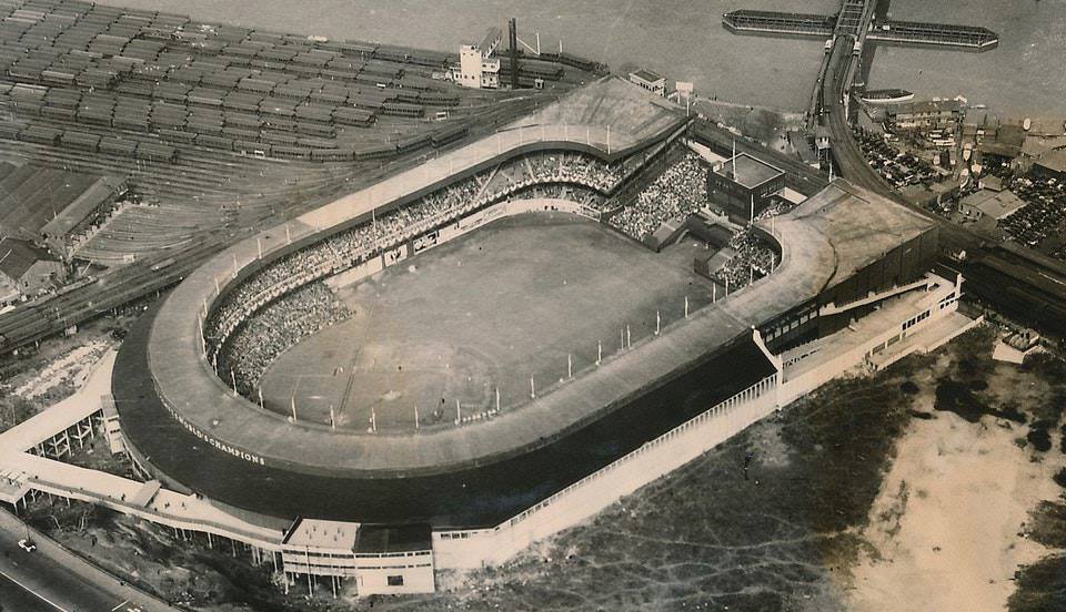OTBaseballPhoto's tweet image. Polo Grounds, Manhattan, 1934 - Found no date with this photo but I'm 99.9% sure its from 1934 (Opening Day?), on front the marquee says "World Champions" and 1933 was only year Giants won series before lights were installed (1940) and after the Polo Grounds was enclosed (1923)