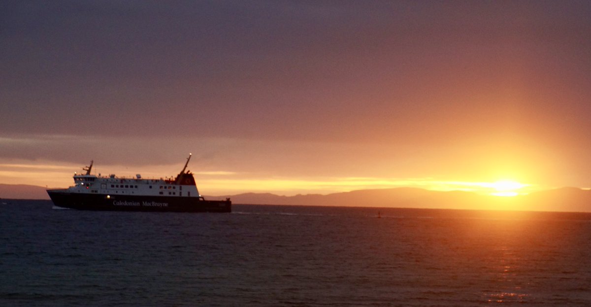 First ferry of 2019 coming into Port Ellen, Islay with the sun rising over Kintyre on the Scottish mainland, just after 9am on January 2.  Picture of #MVFinlagggan taken from the door of Islay Beach Cottage 
 #DayBreak #sunrise #Scotland #winter