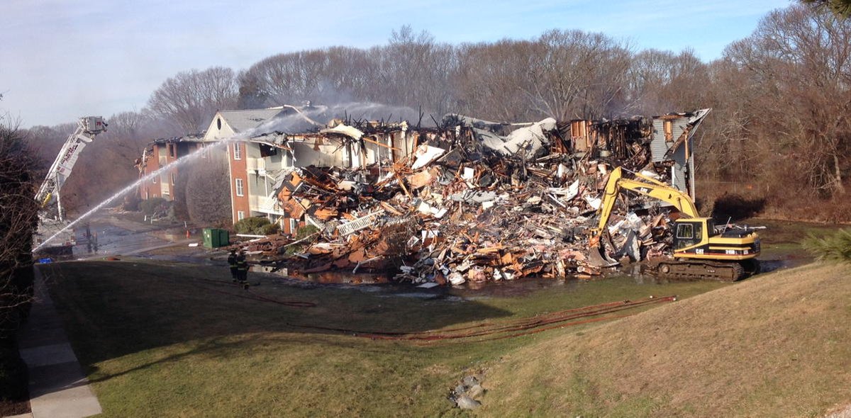 Building 15 at Four Winds Apts, scene of fatal crash and fire Tues. is being demolished right now.