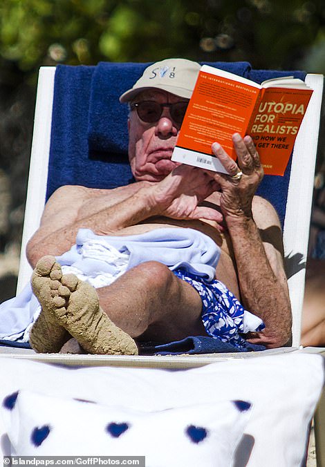 So this is Rupert Murdoch reading my book on universal basic income, the 15-hour workweek, and open borders around the globe. I'm sure he'll love it. dailymail.co.uk/tvshowbiz/arti…