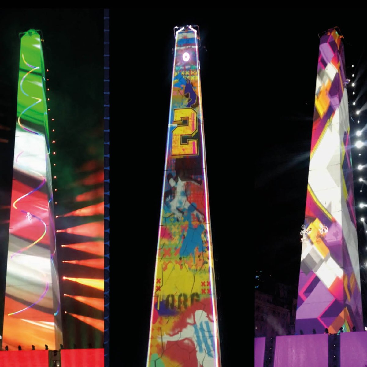 Dataton's tweet photo. #DatatonWATCHOUT in action in Buenos Aires at the Youth Olympic Games opening ceremony. Fantastic concept with a 67m high obelisk as the canvas, 16 projectors on 2 buildings & stunt actors! Content: #vjspetto. Projection: #Infoview. WATCHOUT: #KJPL. More: https://t.co/IshNYHyXrj https://t.co/QiZs4es244