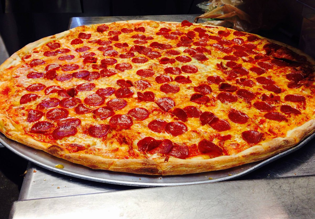 Tired of cooking for the holidays?  Grab a pizza today, you will not regret it! #largestsliceinthetriangle
