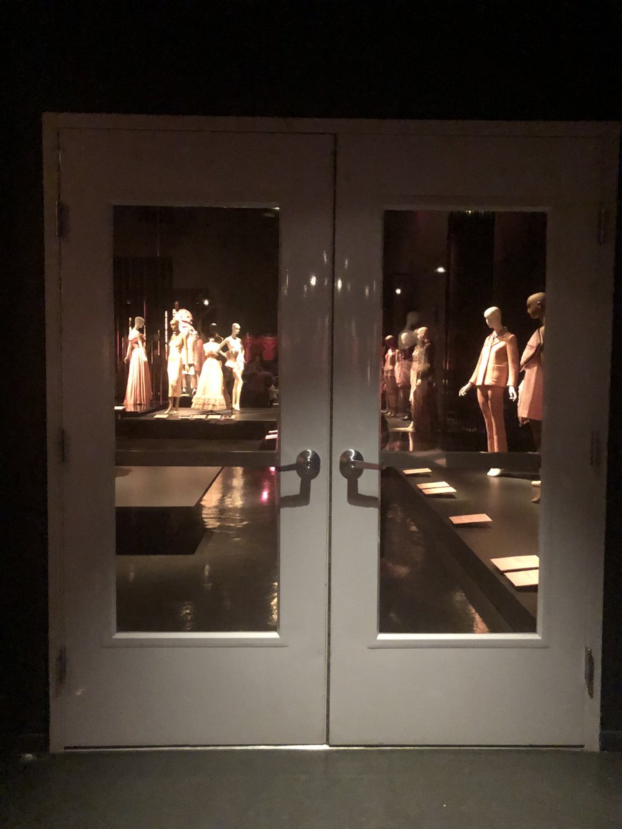 simonebernhard's tweet photo. “A pink that went on to devour everything in its path...” Yves Saint Laurent #YSL History of Pink exhibit at FIT https://t.co/bZNK1wO4hC