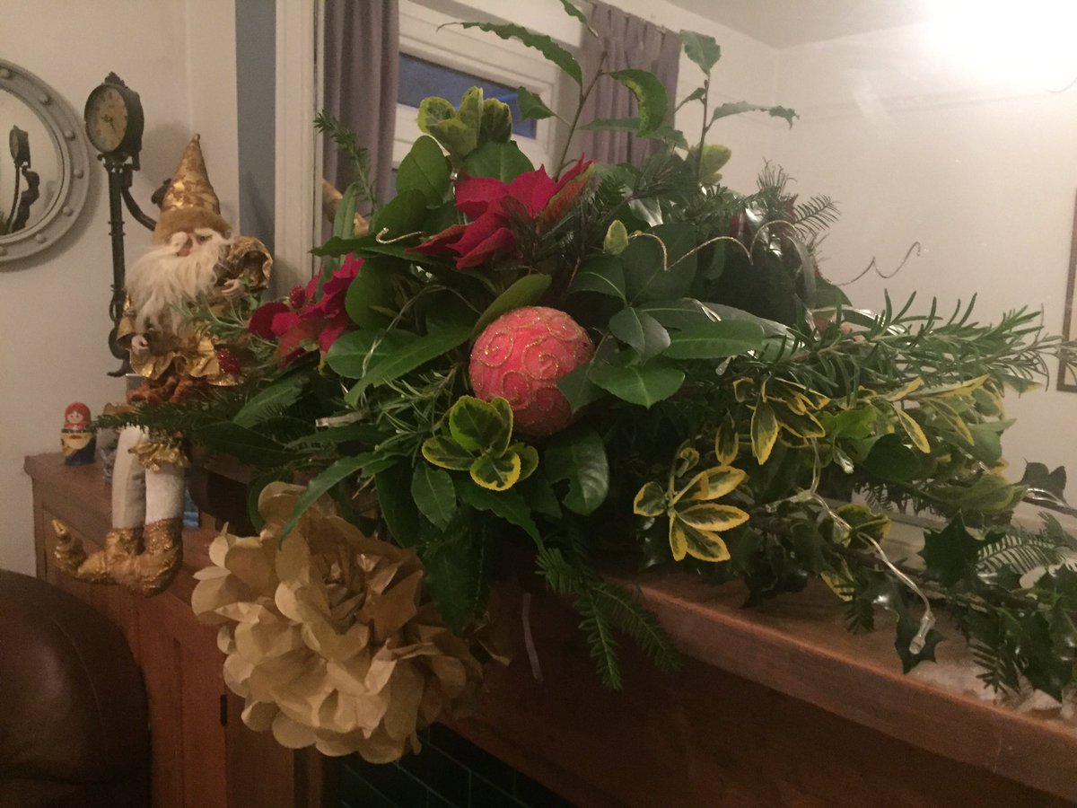 NicholsonStage's tweet photo. Lovely mantle piece display, making the most of the greenery left in the garden!!! #wellingborough #christmas #lovenorthsmpton https://t.co/w6VI8nfVhP