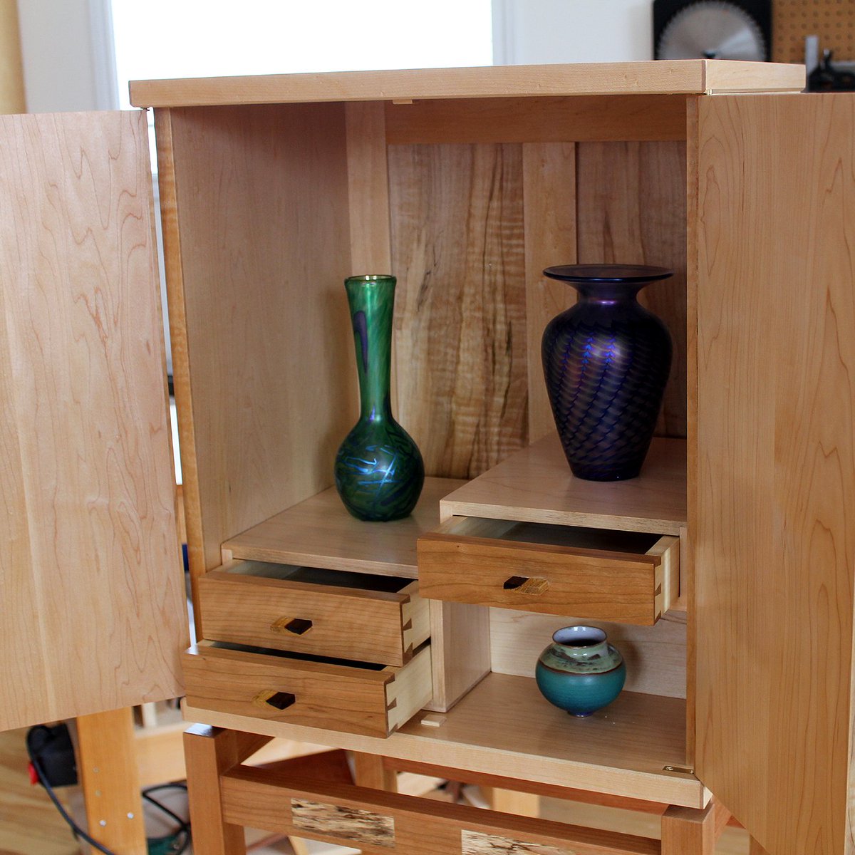 WoodSkills's tweet photo. Krenov-inspired cabinet completed 🙌 Doors +sides French Polished. Hidden compartment behind blue cup.   @pirollodesign @woodskillsmag WOODSKILLS Magazine  https://t.co/qi9Vuqz3dC  #furnituredesign #woodworking #woodworker #krenov #cabinetbuild #ottawa #dovetail #inlay #handmade https://t.co/f37snLvkuv