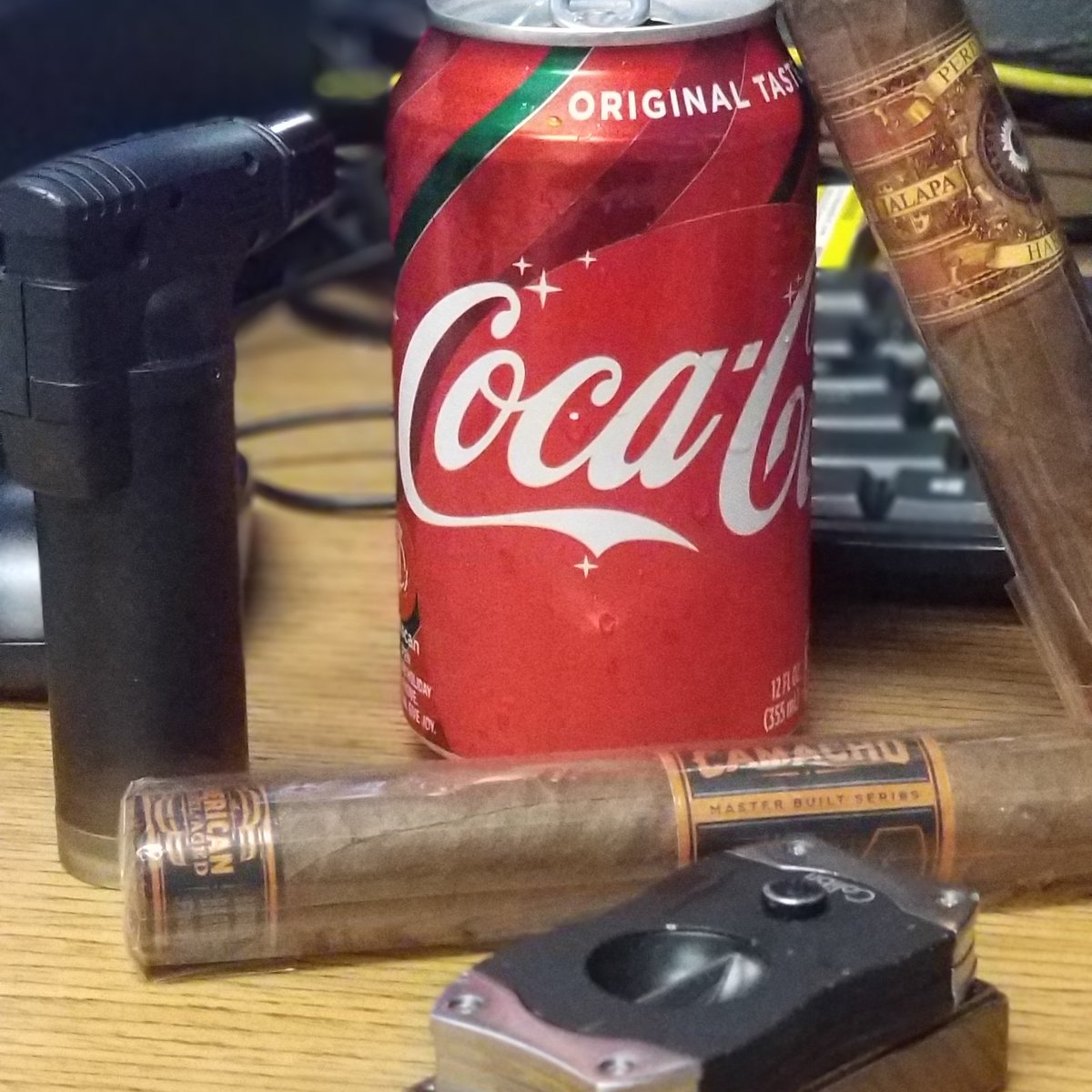 NocturnalCreatu's tweet photo. Another 12 hrs, Have a @CocaCola and a #Stogey. #botl #sotl #cigarsociety https://t.co/uXWkMsgYUV