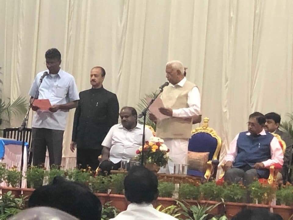 SantoshSindagi's tweet photo. Shri Satish Anna jarakiholi taken oath on the name of Buddha,Basava and Ambedkar as a new cabinet minister of Karnataka state . Happy moment for north Karnataka and all followers 
#karnataka #KarnatakaByElection2018 #assemblyelection2018 #northkarnataka #belagavi https://t.co/huGGbZCGnb