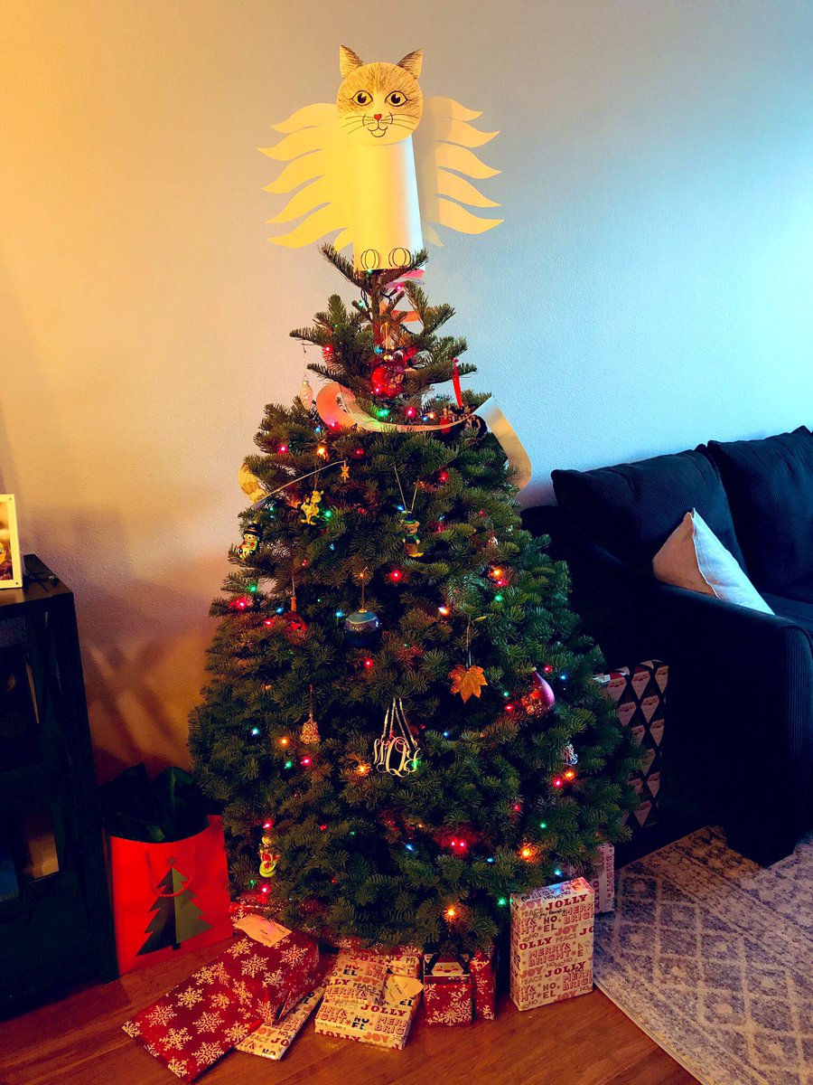 WesleighOgle's tweet photo. We didn’t have a tree topper, so my incredibly talented friend, @The_Moon_Girl, made this purrrrfect topper of SYLVIA! Now she’s the angel we’ve always known she was 😂 @CatAdopt #CATAlum https://t.co/v3QY4QqY8q