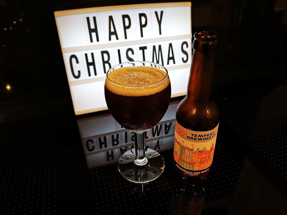 Yarxie's tweet photo. Tempest's "Cranachan wee heavy". Malty beer flavoured with a fruity Scottish dessert. Different and decent. The bottle top says "designed &amp; built in the Scottish Borders". Reminds me of the Irn Bru tag-line "made in Scotland, from girders"! #xmascheers @TheBeerHawk https://t.co/vBqIFFZgdZ