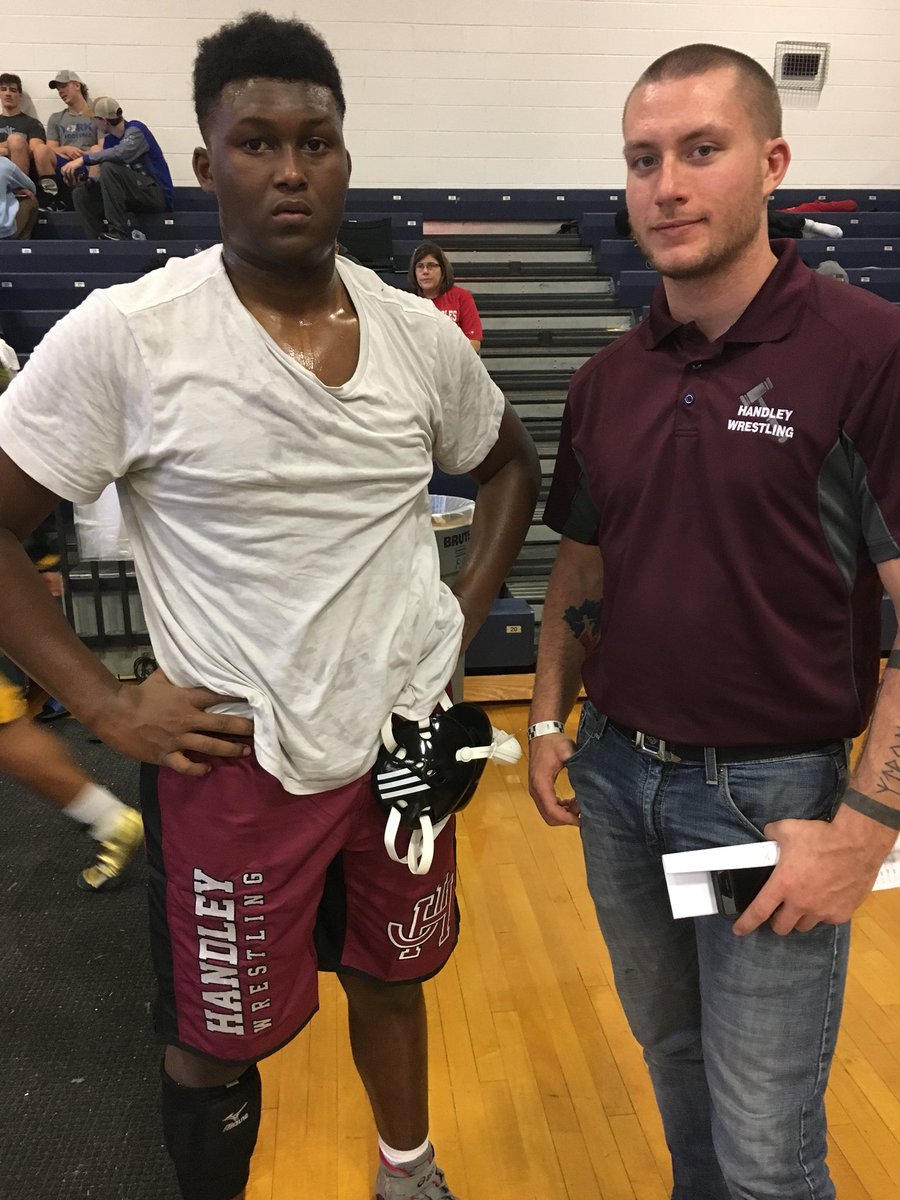 troymezz's tweet photo. Our guys battling tough here at Ocean Lakes HS. Web Bentley, Ethan  Bishop, Tommy Downey in Finals. Mac Gordon wrestling for 3rd. Landen and Raequan wrestling for 5th. #HandleyPride https://t.co/IWdBbaBibD