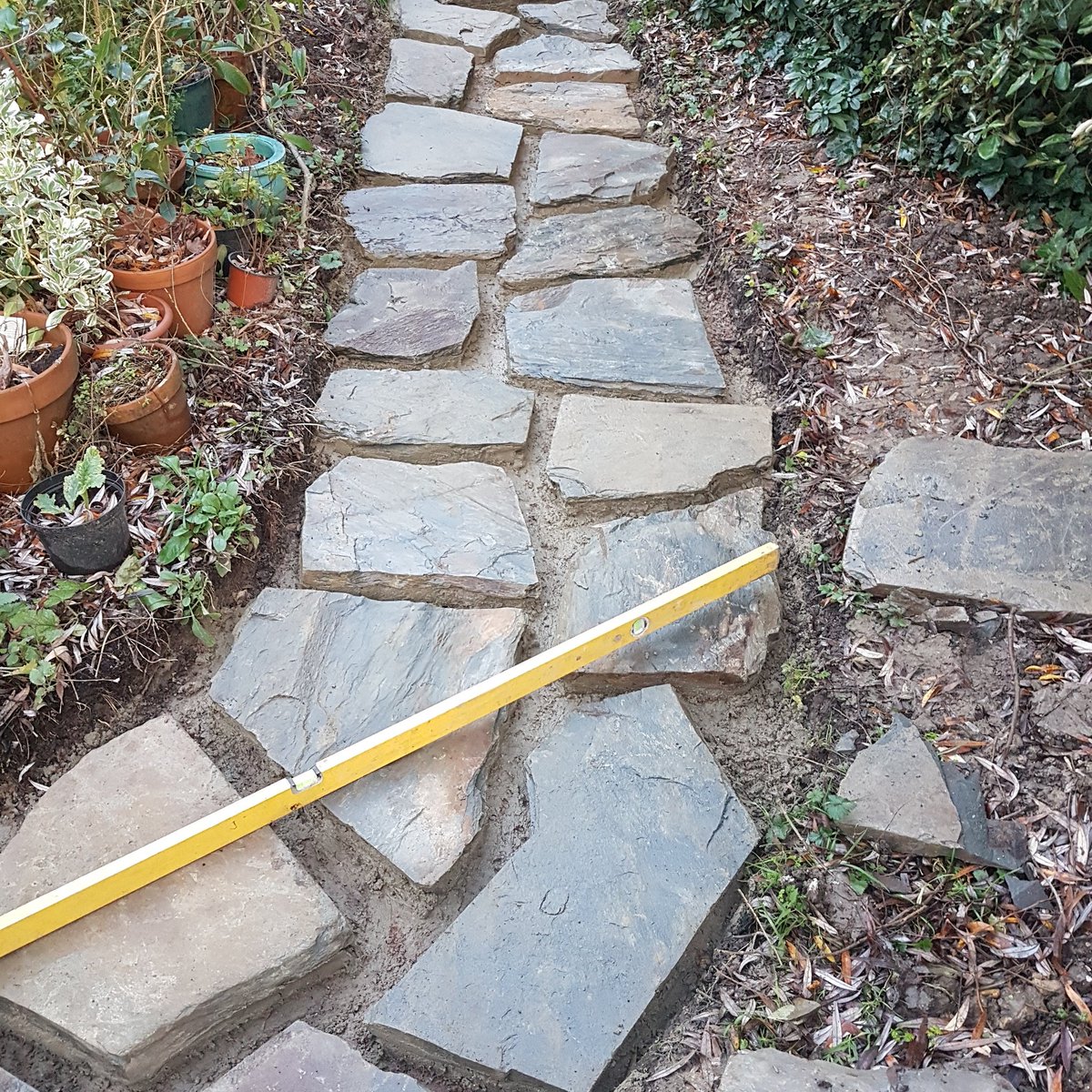 StoneWoodServ's tweet photo. Just before Christmas, we managed to deliver beautiful slate stone. A stylish path was created on the same day. #landscaping #gardening https://t.co/ChpH6qeJRJ