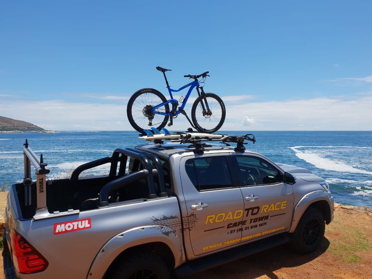 roadtoracesa's tweet photo. How’s your December going? We are utilizing this RTR36 Toyota Hilux to the max🤩🏄🏼‍♂️🚴🏼‍♀️ Thank you @thule_sa for this insane rack🙌🏻🔥#bestinthebusiness #transformation #toyotahilux #upgrade #holidays #capetown https://t.co/UHSjvdLZC6