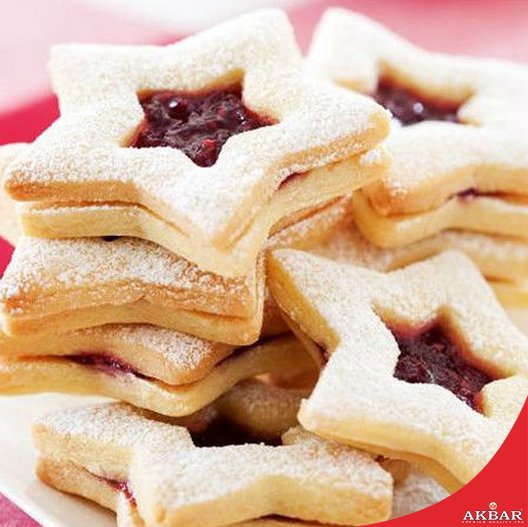 Akbar_CeylonTea's tweet photo. These star biscuits are ideal for Christmas! Use your favourite jam in the centre. Recipe - https://t.co/Flb1DTRvmr https://t.co/IYnSPS1vAv