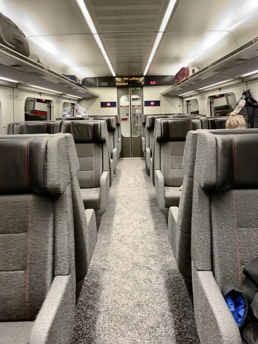 alan_firth_'s tweet photo. On Danish train, heading to Copenhagen. State-owned &amp; state-run DSB. 3hrs 45 min journey. Standard class, 1-way, booked week in advance, 415kr (£46). Quiet, comfortable, wide-body carriage, free wifi, immaculately clean. When they say nationalised railway doesn’t work, look here. https://t.co/yLWQTkMC7c