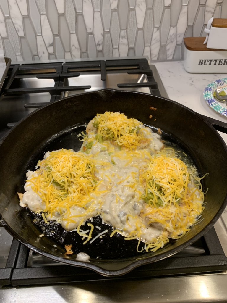 SteveS32's tweet photo. #ChristmasEveEveDinner is much simpler, skillet green chile chicken enchiladas. I just cook the chicken, scoop a little cream of mushroom under each breast, and top with green chile and cheese https://t.co/iLcNTPjOYP