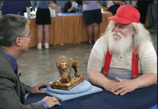 Marvellous photo of Santa on the Antiques Roadshow just making sure he's not giving away something really expensive.