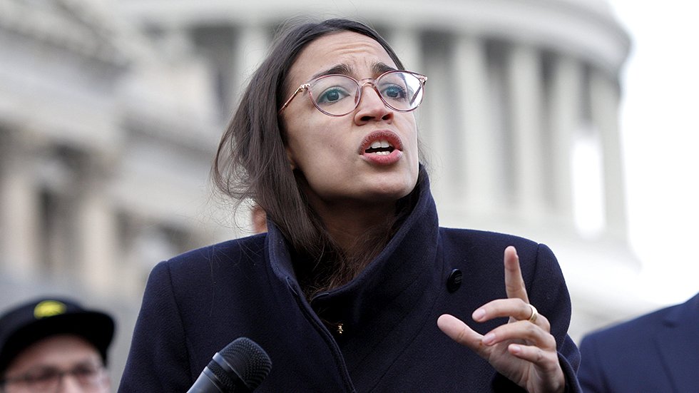 thehill's tweet photo. Ocasio-Cortez calls for congressional salaries to be furloughed during shutdowns: "Have some integrity" https://t.co/xNVFluiSZs https://t.co/Y7ez6BjAp2