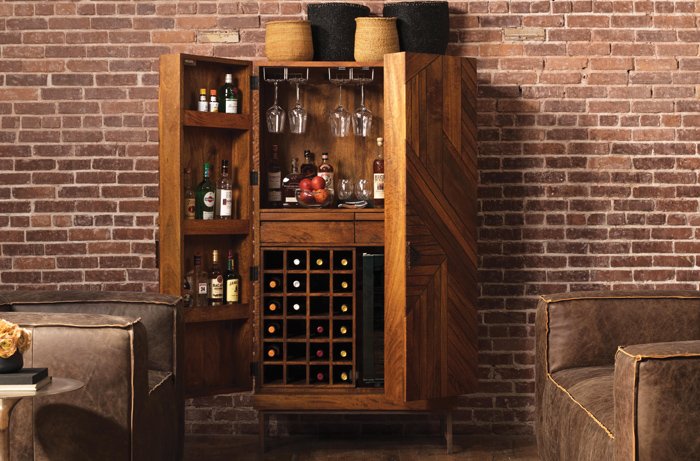 WineEnthusiast's tweet photo. Made from solid mango wood with bronze finished metal inlays, the Cheverny Bar Cabinet will make a statement to any space in your home. #WEstudio https://t.co/LAnidyDeP4 https://t.co/ESZyvkxUwE