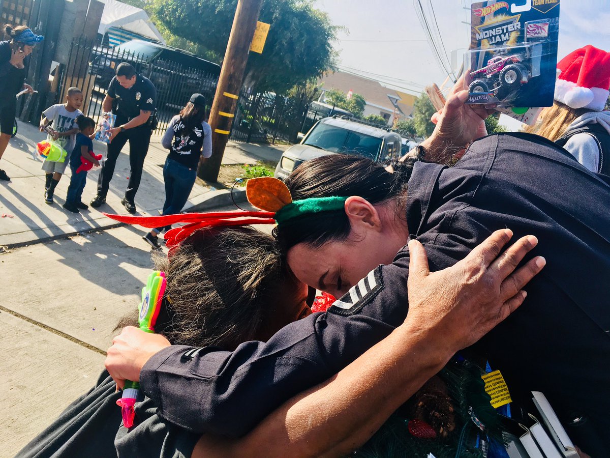 LAPDStoecklein's tweet photo. There are no words to describe the feeling of embracing the love of our community. @NewtonLAPD #SouthPark #SouthLA #LAPD https://t.co/rMVwPTJlG5