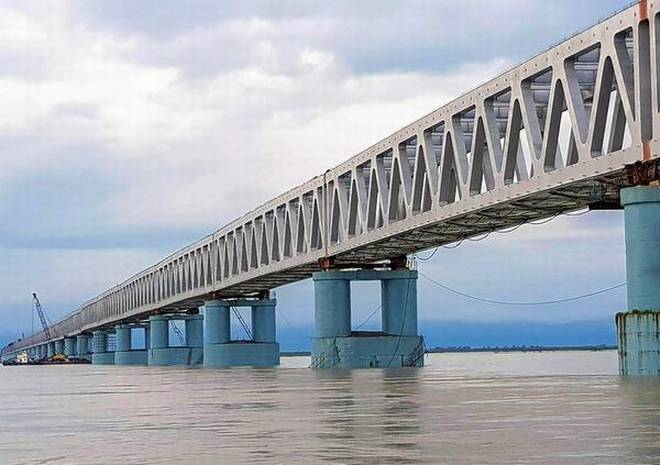 PakajSah's tweet photo. Bogibeel in Assam,Foundation stone was laid in 1997 by then prime minister H.D. Deva Gowda former prime minister ATAL BIHARI VAJPAYEE inaugurated Construction work in 2002 Prime Minister @narendramodi will open it on 25th Dec 2018, the Birth Anniversary of Former PM @AtalBajpeyi https://t.co/HpjTxTmmE4