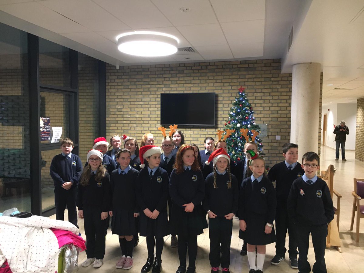 WesternHSCTrust's tweet photo. #ThankYou Momentum Choir, St Mary's College and St Mary's PS, Claudy for singing at our North West Cancer Centre #WT12DaysOfChristmas https://t.co/wvIq8CQsWT
