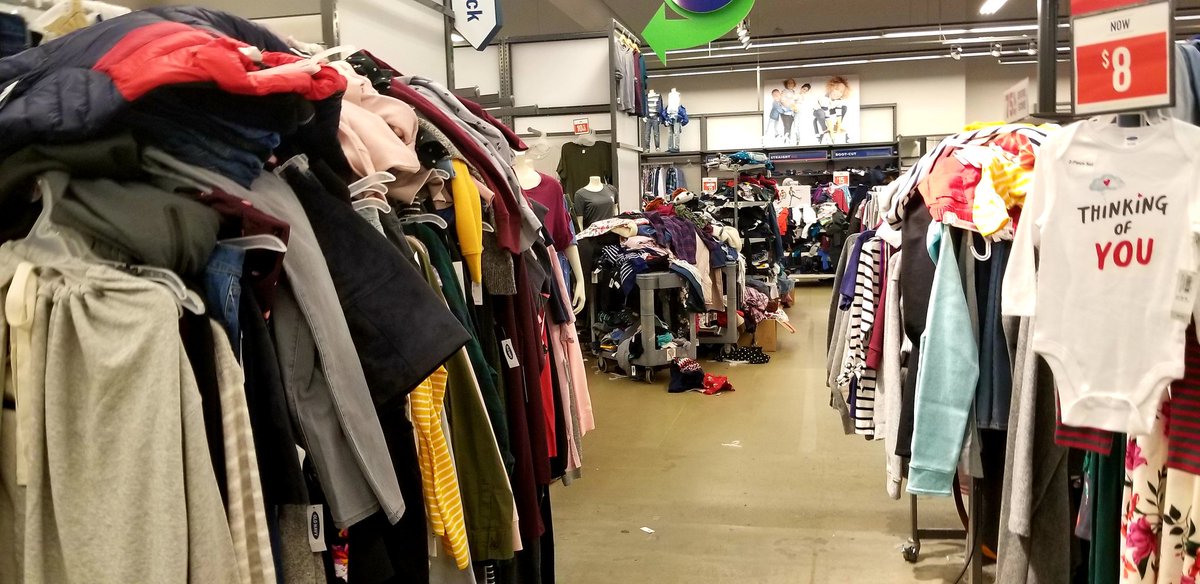 PhillyScrapple's tweet photo. @OldNavy store 6463 in Philadelphia. Upper management fired the last store manager because the store looked a mess. Here's the store long after they fired the manager. Bonus: three associates were standing around a fixture doing nothing. Never coming to this store again https://t.co/Xz8Vpn3rR4