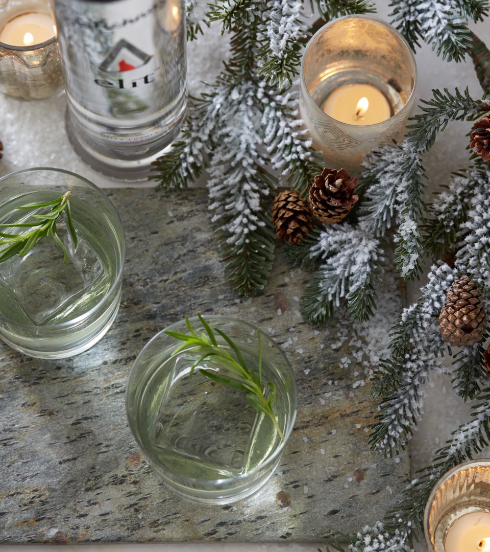 The elit Rosemary Gimlet is sure to keep you warm this holiday. 
- 2  parts  elit  vodka
- ¾  part  rosemary  syrup
- ¾  part  lime  juice
Shake &amp; strain  over  fresh  ice.  Garnish with a Rosemary  sprig.