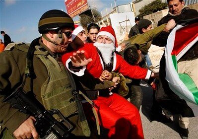 Africa4Pal's tweet photo. By midnight, Santa Clause will be rolling down chimneys of children’s homes, delivering gifts they’ve asked for this Christmas. Santa would probably not reach Palestine because of the military occupation &amp; no freedom of movement. If he makes it, he will find them in Israeli Jails https://t.co/GiCKi1qLDM