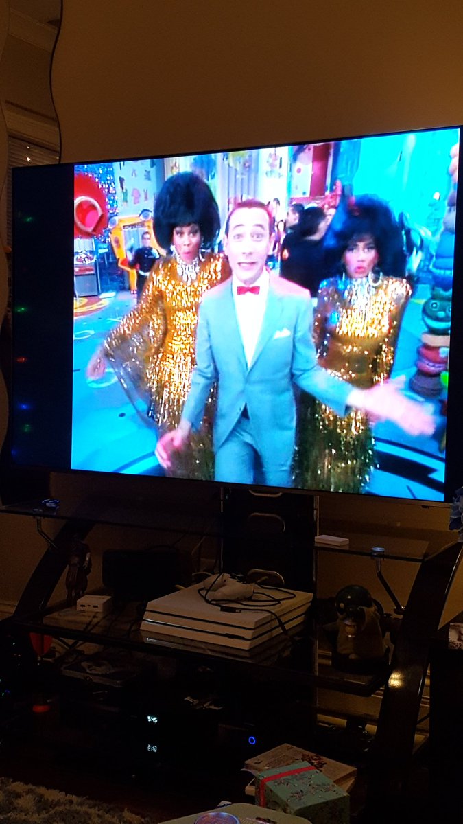 IrisAir's tweet photo. @peeweeherman my boyfriend @WuXVIII refuses to wrap  Christmas presents without this on. https://t.co/j0CA5XcBVJ