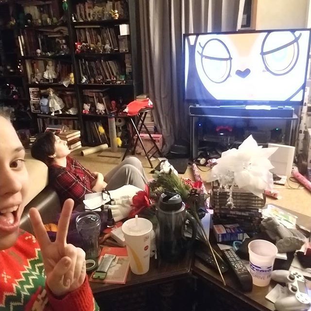 CalciferCosplay's tweet photo. Watching #aggretsuko with my #besto in my #christmasvesto .
.
.
.
#christmaseve #besties #selfie #ignoremymess #wrappingpresents https://t.co/QrejZ207qE https://t.co/gyUxvwX8ii