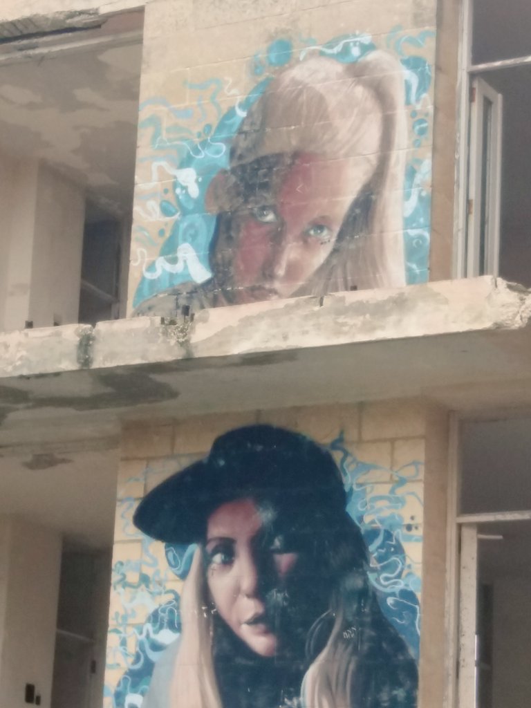 AFBSUK's tweet photo. Graffitti on the walls of the former St Patrick's Married Quarters, Pembroke, Malta. Beauty amongst the ruins. Merry Christmas. 🙏 https://t.co/U5ejGiFUnv
