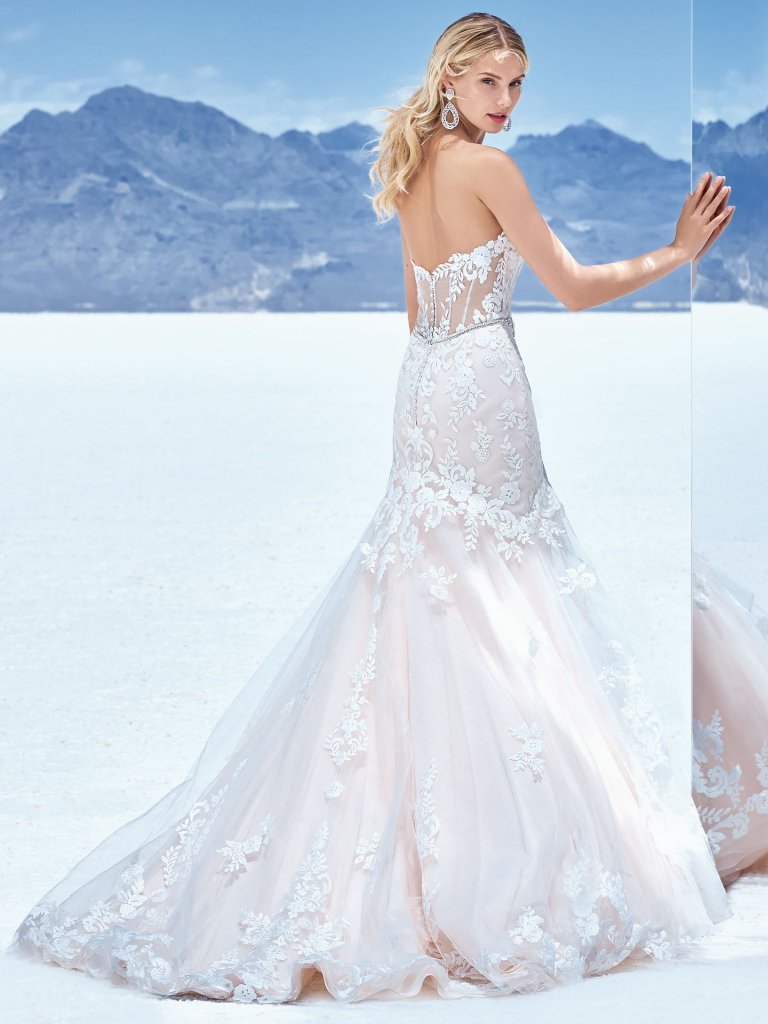 It is all about the details. We are in love with this Sottero&amp;Midgley beautifully beaded belt accented in Swarovski crystals, a strapless sweetheart neckline, and illusion scoop back with exposed boning accented in lace motifs. <a href="/maggiesottero/">Maggie Sottero Designs</a>