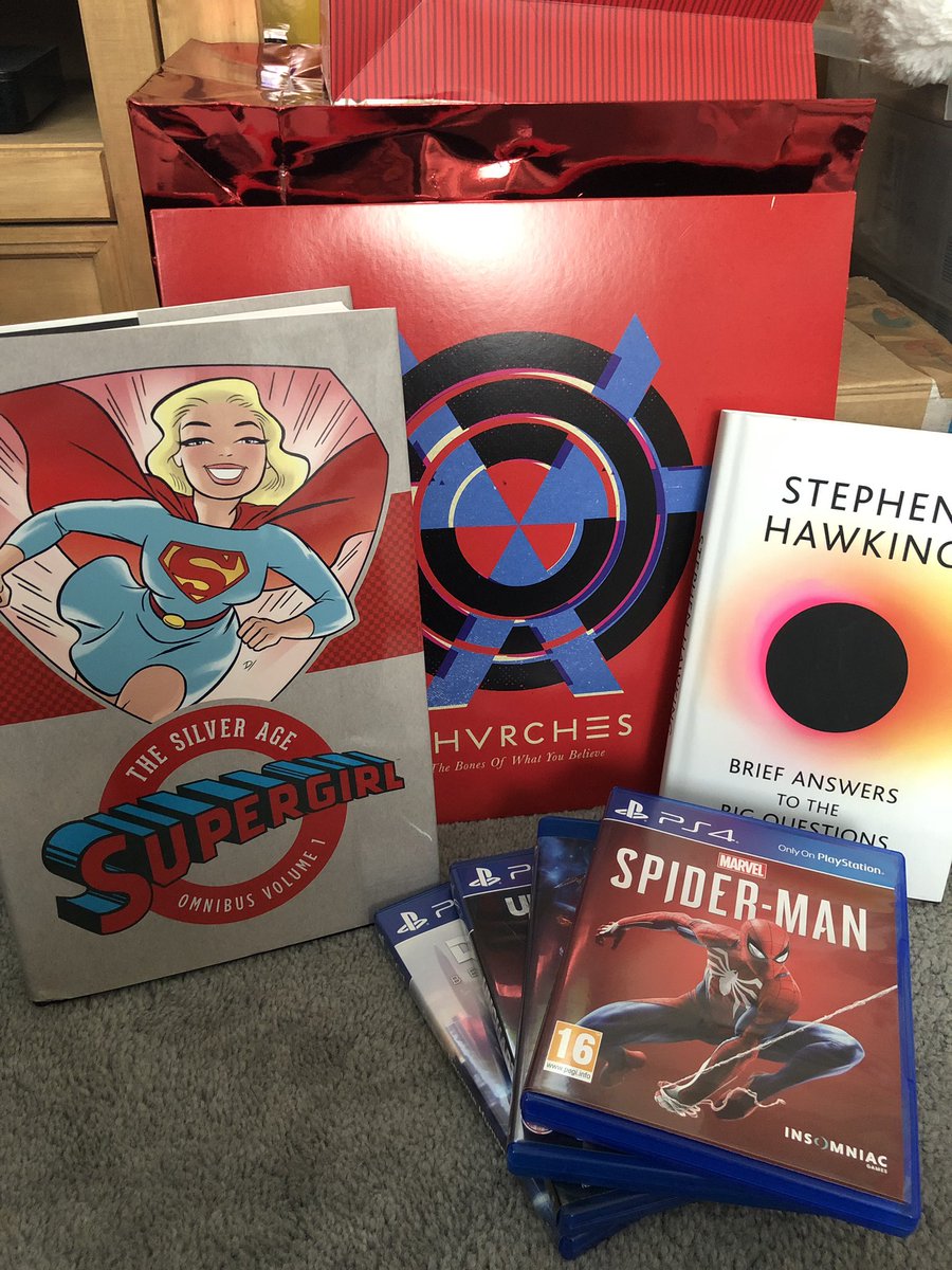 JazzKGD's tweet photo. Some of the lovely Christmas presents I’ve had today. Can’t wait to start reading #Supergirl silver age. https://t.co/dz31FrBVWD