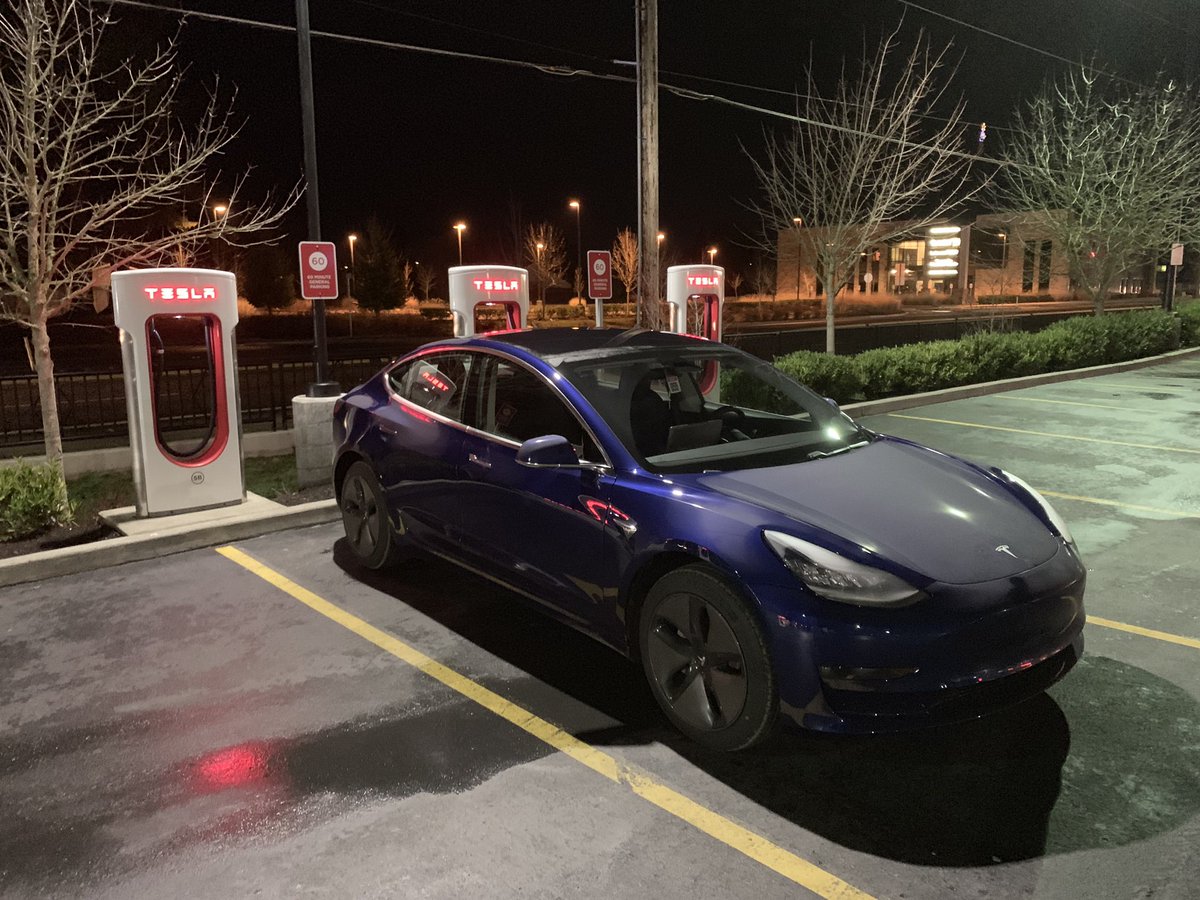 mrandybeck's tweet photo. @kimpaquette My new Model 3 (2 days old!) is simply amazing. Had to leave Christmas Eve dinner when my brother in-law started pontificating about how Tesla is a horribly run business and how it’s stupid that you have to touch the steering wheel with autopilot. Went to charge for some peace! https://t.co/hk0edtAleF