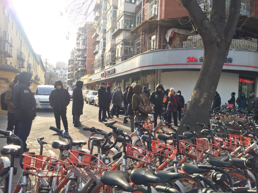 evadou's tweet photo. Heavy plainclothes security presence outside the courthouse this morning for Wang Quanzhang’s trial in Tianjin. One supporter, activist Yang Chunlin, taken away after shouting support for Wang and criticism of the govt - a rare sight on Chinese streets these days https://t.co/lpp3tz3lsR