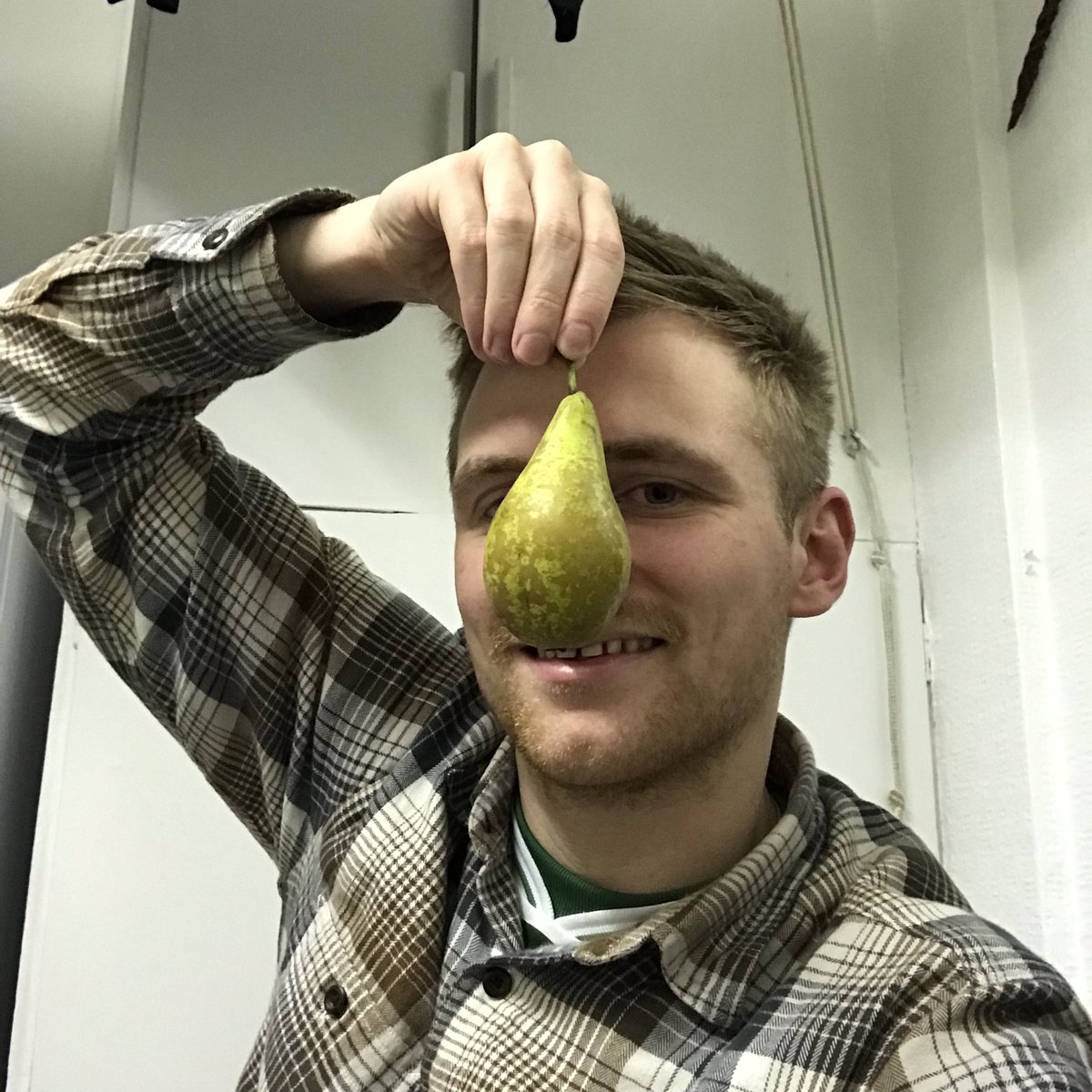 Very shy &amp; hiding behind a pear x