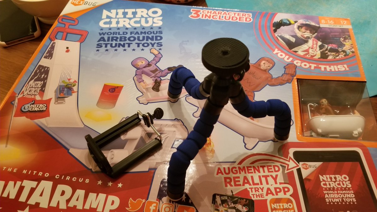 Mess2140's tweet photo. @HEXBUG my son loves you products but have an issue.  I bought my son the gigantaramp for Christmas and it seems the plastic thread on the tripod came stripped.  Is it possible to send a new tripod and phone holder? https://t.co/rkBoXsiHKA