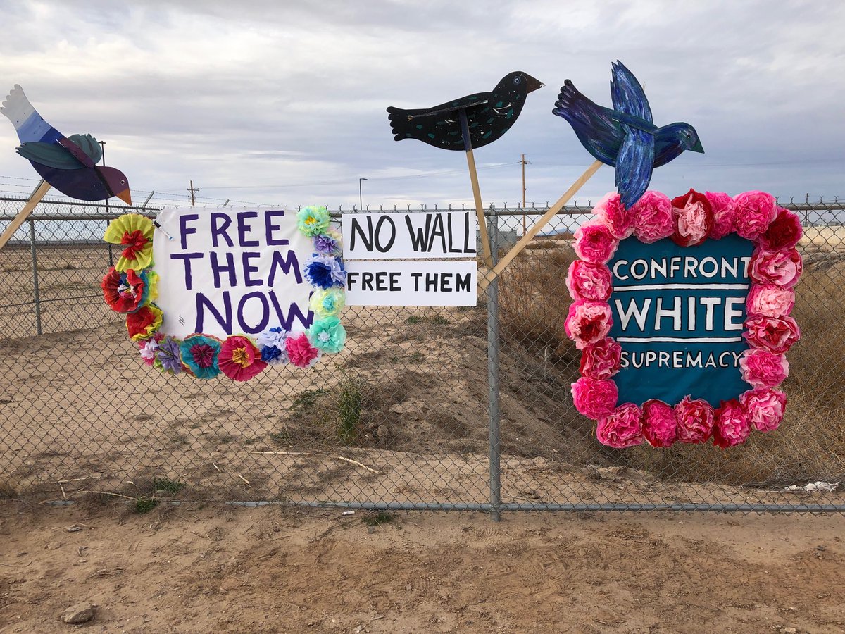 sharpetom's tweet image. Protest signs near Tornillo, Texas, detention camps for immigrant children.