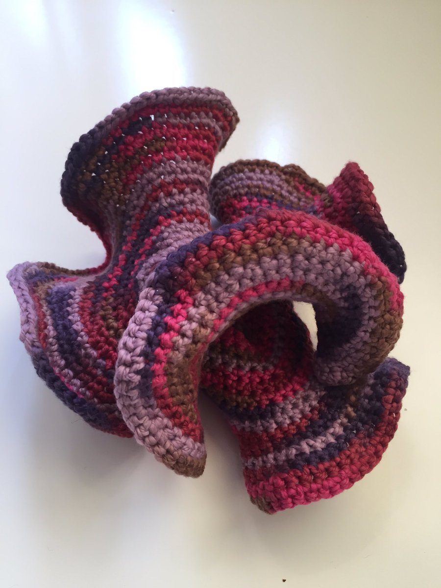 mathinyourfeet's tweet photo. My three little December beauties. #hyperbolicplane #noneuclidean #geometry #mathart #mathyarns #mathoffthepage https://t.co/tjpR2W1tFZ