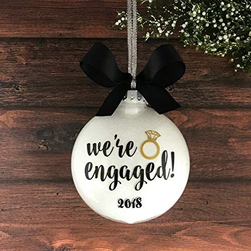 Well.... do we have any newly engaged couples out there?! #christmasproposal #engaged #ido #congratulations