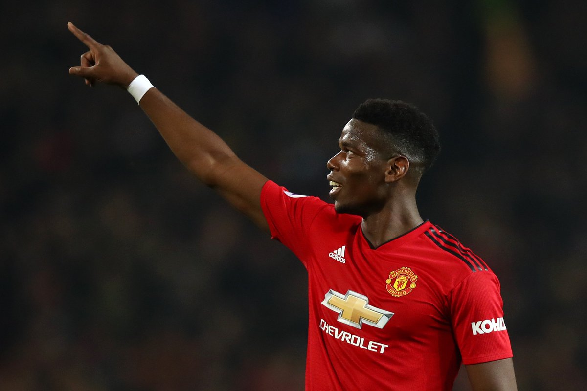 Paul Pogba of Manchester United celebrates after scoring his team's third goal