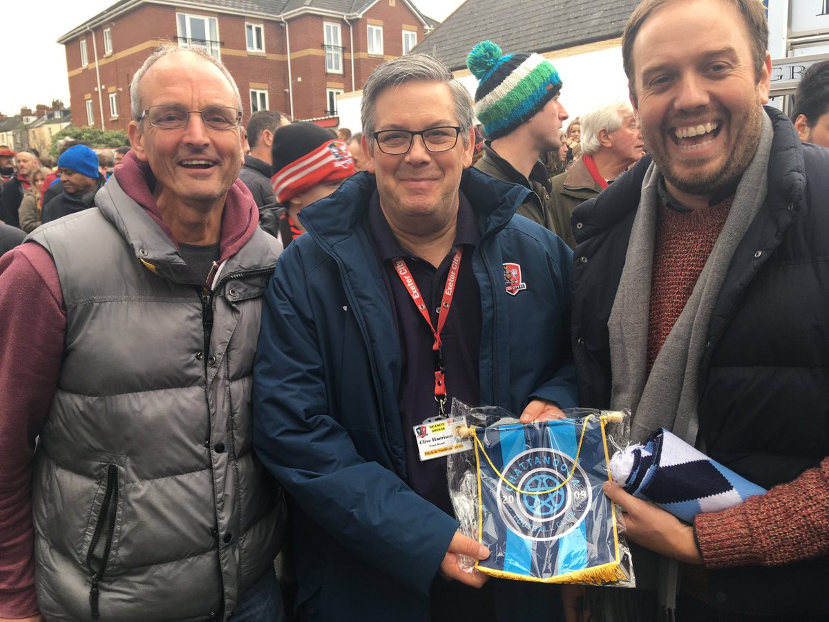 ChattanoogaFC's tweet photo. While at home in 🇬🇧, @ChattanoogaChap met @OfficialECFC Club and Trust Directors Pete Holding (left) and Clive Harrison, who’s said “Thank you so much for the scarf and pennant which will be given to our Museum collection.”

Thank YOU, ECFC for the hospitality and sage advice! https://t.co/sXt2Egi5bw