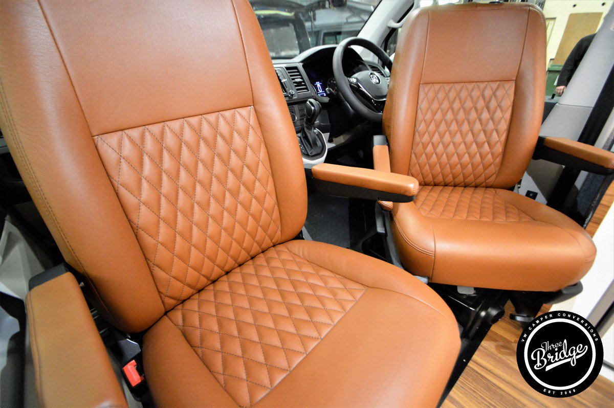 Trek_RV's tweet photo. LWB VW T6 Infinity campervan conversion, lovely brown leather, RIB read seat/bed, Waeco fridge, Webasto diesel heater, Reimo roof, oven and grill, Thule awning, LED dimmable strip lighting. #reimo #rib #waeco #webasto #leather #thule #campervan #3bridge https://t.co/TnOup2xFlz