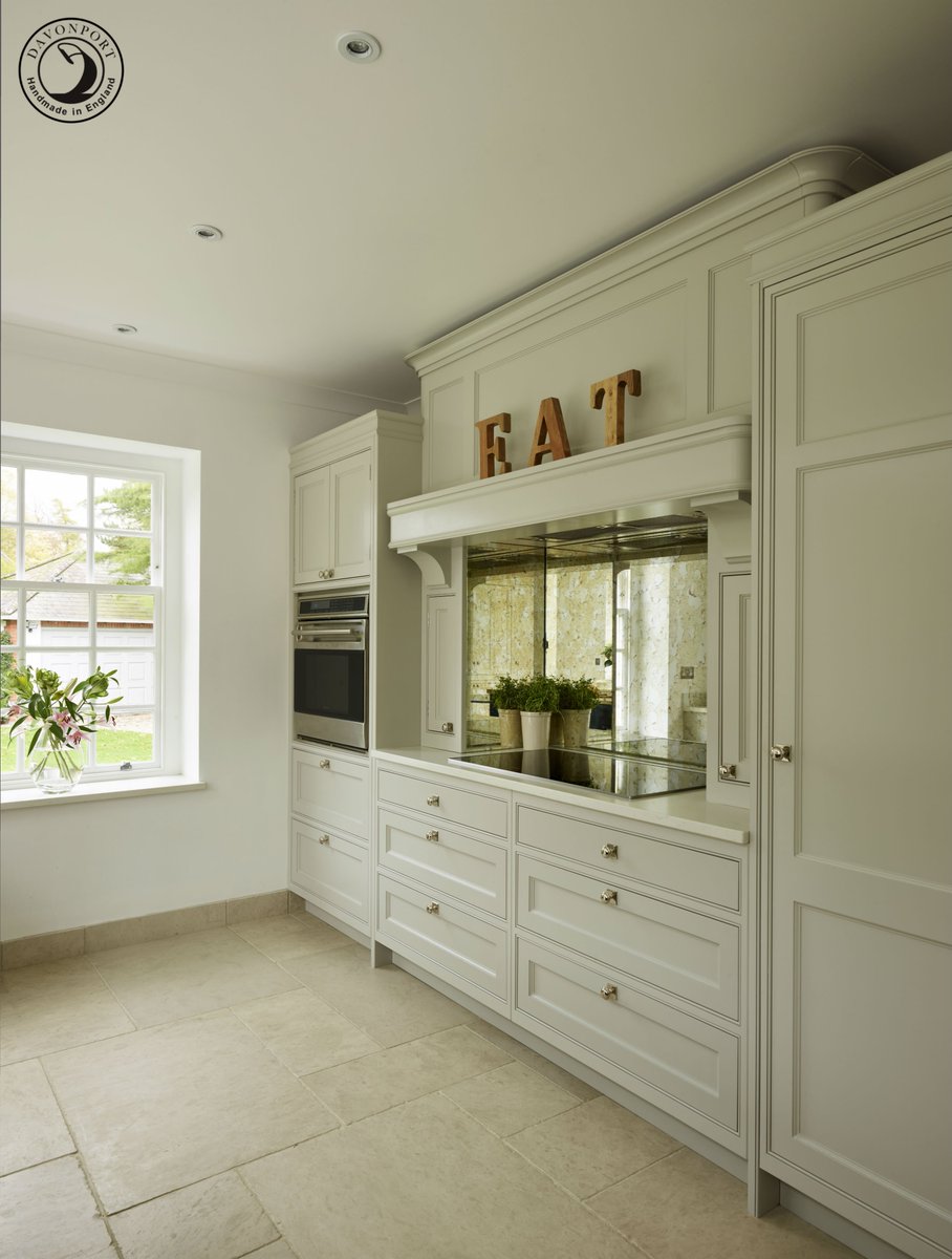 Making the most of natural light in a #kitchen scheme is all important. The large sash windows in this Georgian country house allow light to flood the room. The antiqued mirror splashback bounces light around the space... the perfect place to while away the hours.