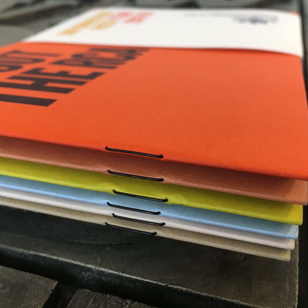 PureprintGroup's tweet photo. #tbt to these great @RCA brochures printed on @Antalis_UK Keaykolour & Pop'Set in a set with a belly band. There are a huge number of wire colours available to create a point of difference for your saddle stitched publication #binding #creativebinding #brochures #RCA https://t.co/fTIBNKoaQN