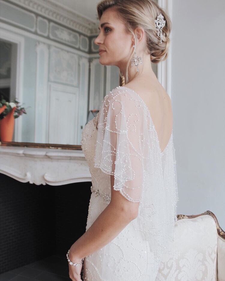 fairytalebride2's tweet photo. This is a WOW dress! A vintage inspired bridal gown with a ultra modern twist. We are in love with the beautiful beaded cape back. 😍 #fairytalebride #coggeshallweddingshop #coggeshall #Colchester #essex #weddingdress #vintage #gatsby #bridalgown #bridetobe #engaged https://t.co/oqH6yVcVqw