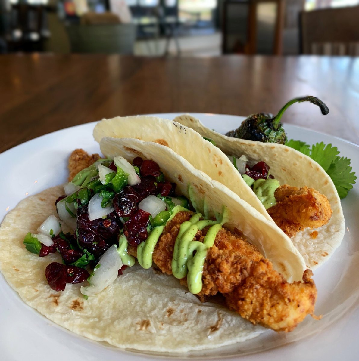 DevineStCola's tweet photo. The @Cantina76 Turkey Taco is back... this week only!!! Lightly-fried turkey taco topped w/cranberry salsa + garlic sage aioli... 👉 Yum!!! #shoplivedinedevine #DevineStreet #supportlocal #dinedevine #turkeytaco #thisweeksspecial https://t.co/DdzRcgwQ4z
