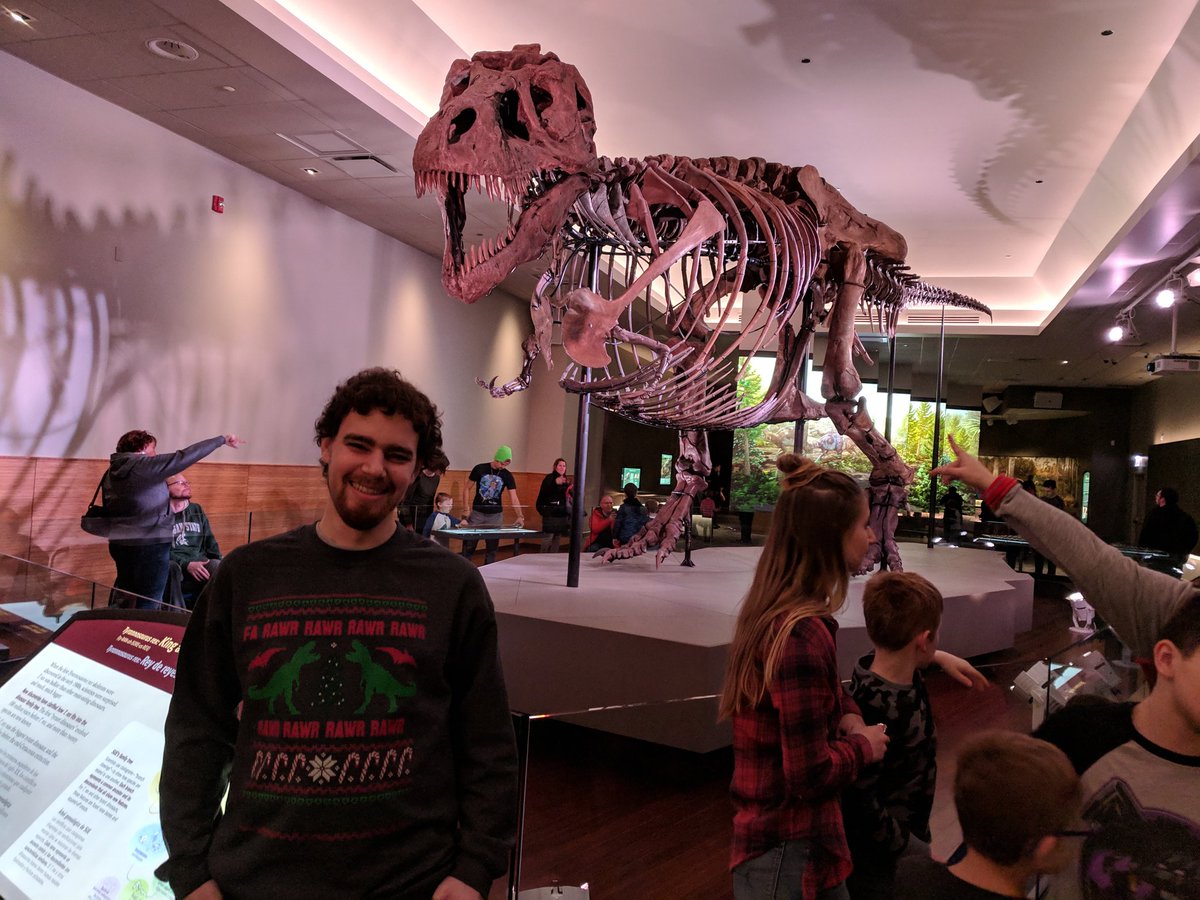 biochemnerd's tweet photo. Successful Field Museum trip:
-Said #HelloMaximo
-Found Tiktaalik without going to Nunavut with @NeilShubin
-Chilled with the oldest known eukaryote fossil
-Agree that @SUEtheTrex is more impressive and imposing with their gastralia
-Confirmed they should market this Xmas sweater https://t.co/ihziRjth0T