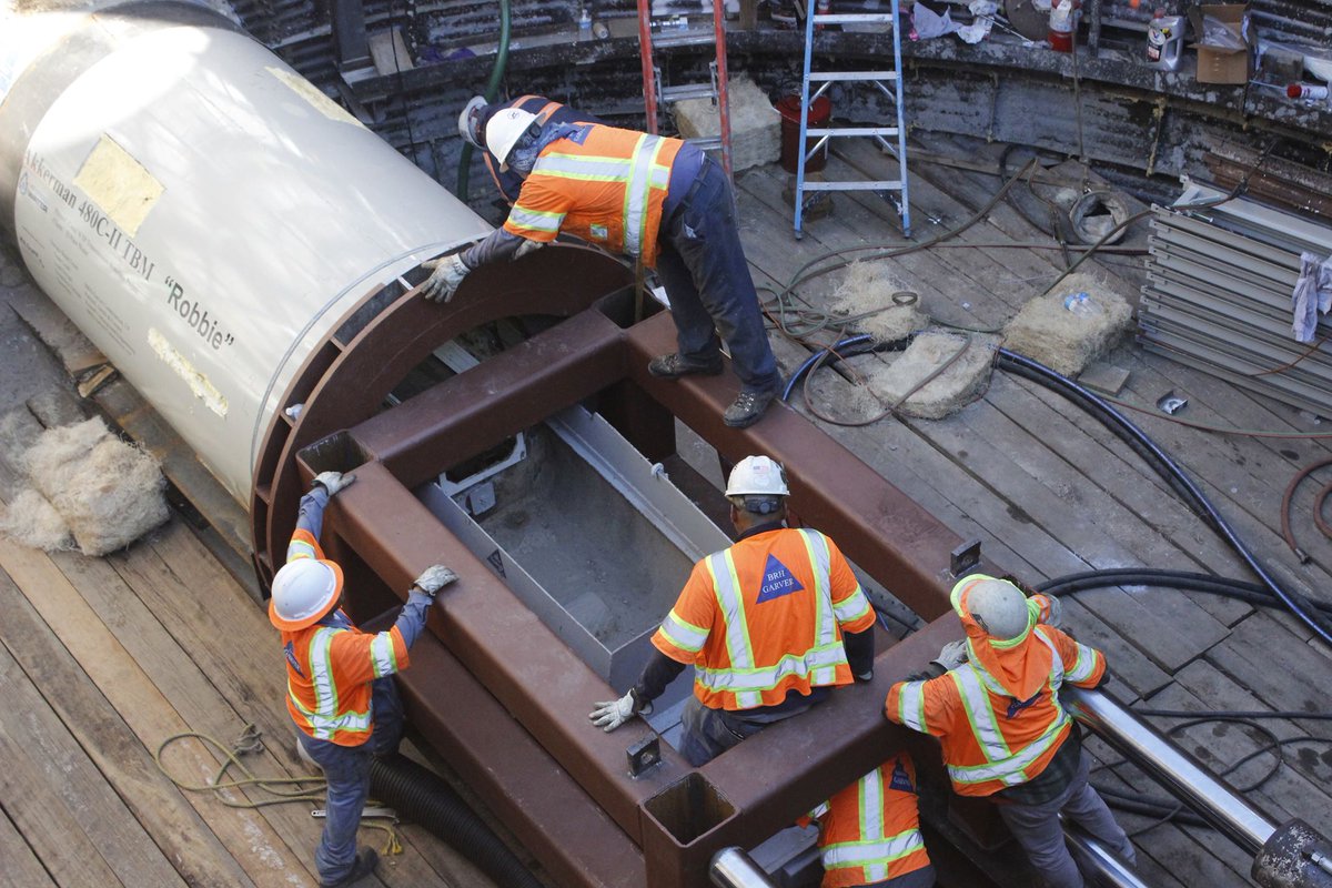 Parkhill1945's tweet photo. The Canal #WTP Discharge Transmission Main project requires a 66-inch-diameter, 570-ft-long tunnel under 18 active tracks of the BNSF railyard & a 2nd 315-ft-tunnel across Paisano Dr. Tunneling was completed by @BRHNews using an @AkkermanInc TBM. https://t.co/VNqXgWLTt8 https://t.co/I4TX2QjuaJ